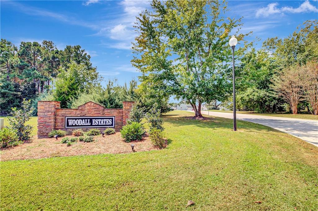 130 Catalpa Road Milner, GA 30257 - Photo 21 of 23 a sign board with ocean view