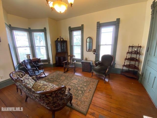 25378 Cyclone Ridge Road Lanark, IL 61046 - Photo 17 of 33 a living room with furniture rug and window