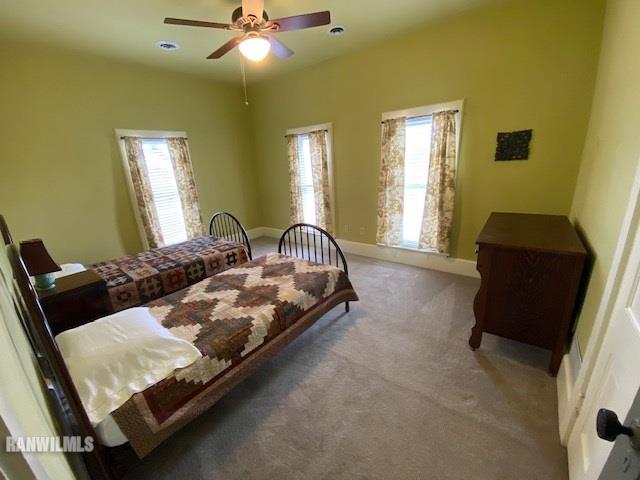 25378 Cyclone Ridge Road Lanark, IL 61046 - Photo 26 of 33 a bedroom with a bed and window