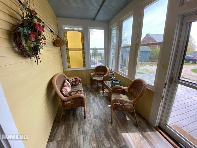25378 Cyclone Ridge Road Lanark, IL 61046 - Photo 9 of 33 a living room with furniture and a large window
