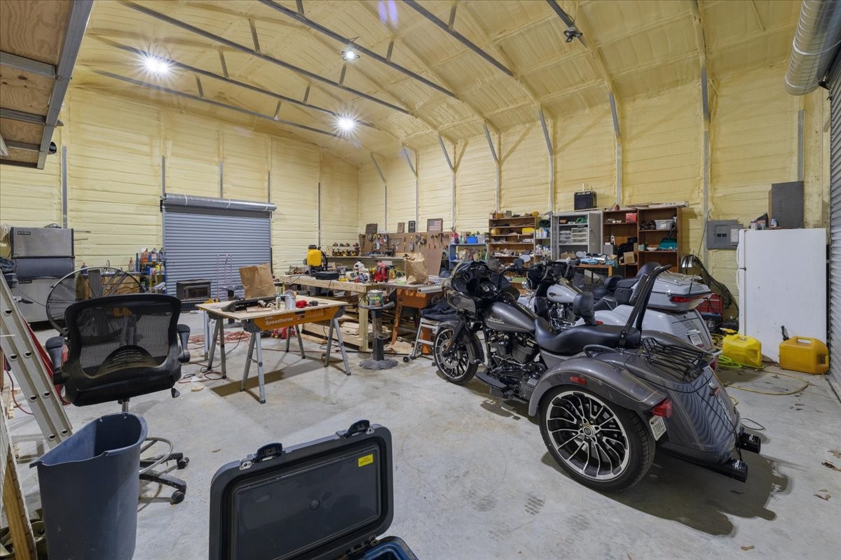 755 Mallard Street Hemphill, TX 75948 - Photo 25 of 27 a car parked in a garage
