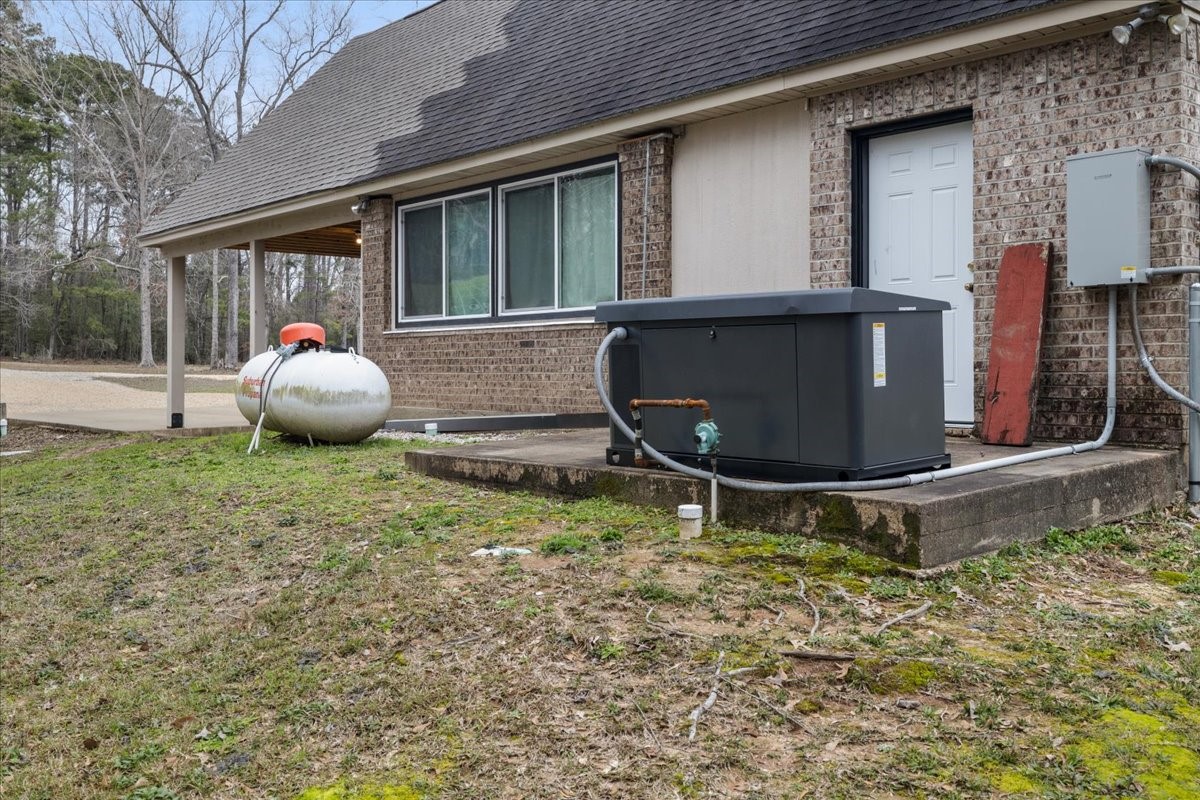 755 Mallard Street Hemphill, TX 75948 - Photo 3 of 27 a front view of a house with garden