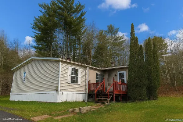 a view of a house with backyard