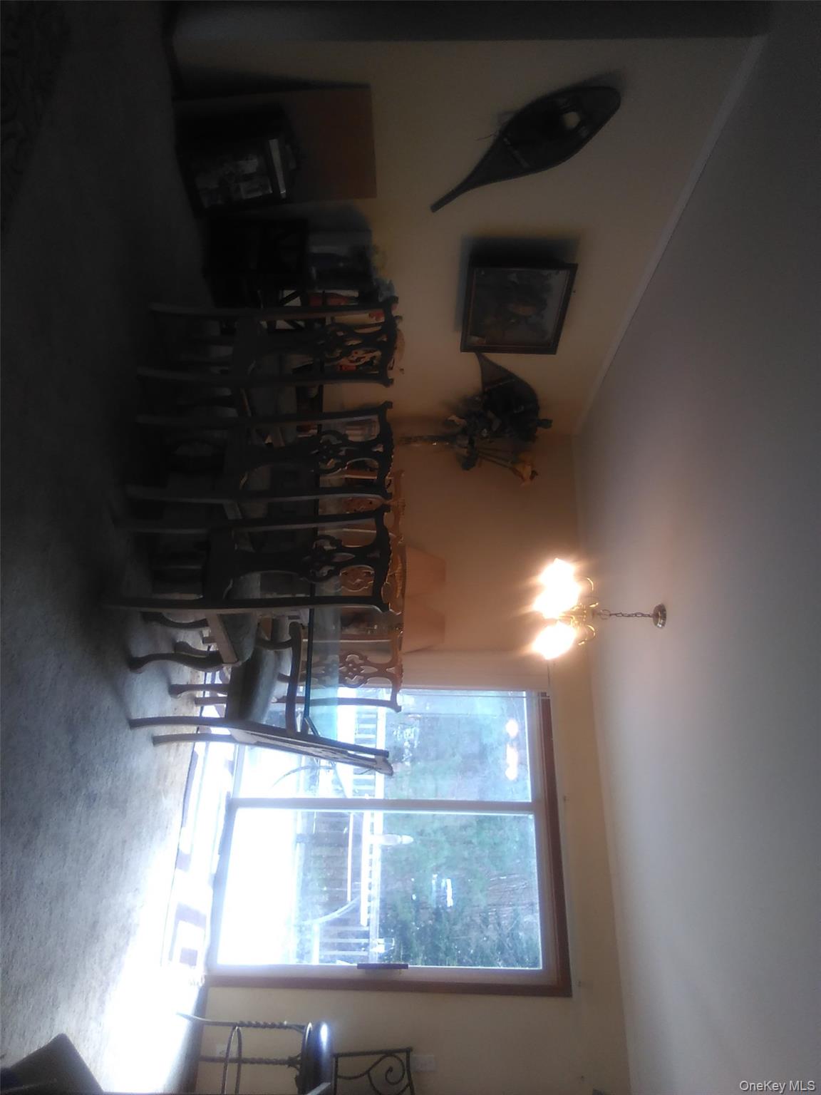 2032 Champlin Road Jefferson, NY 12093 - Photo 12 of 20 a view of a livingroom with furniture and a fireplace