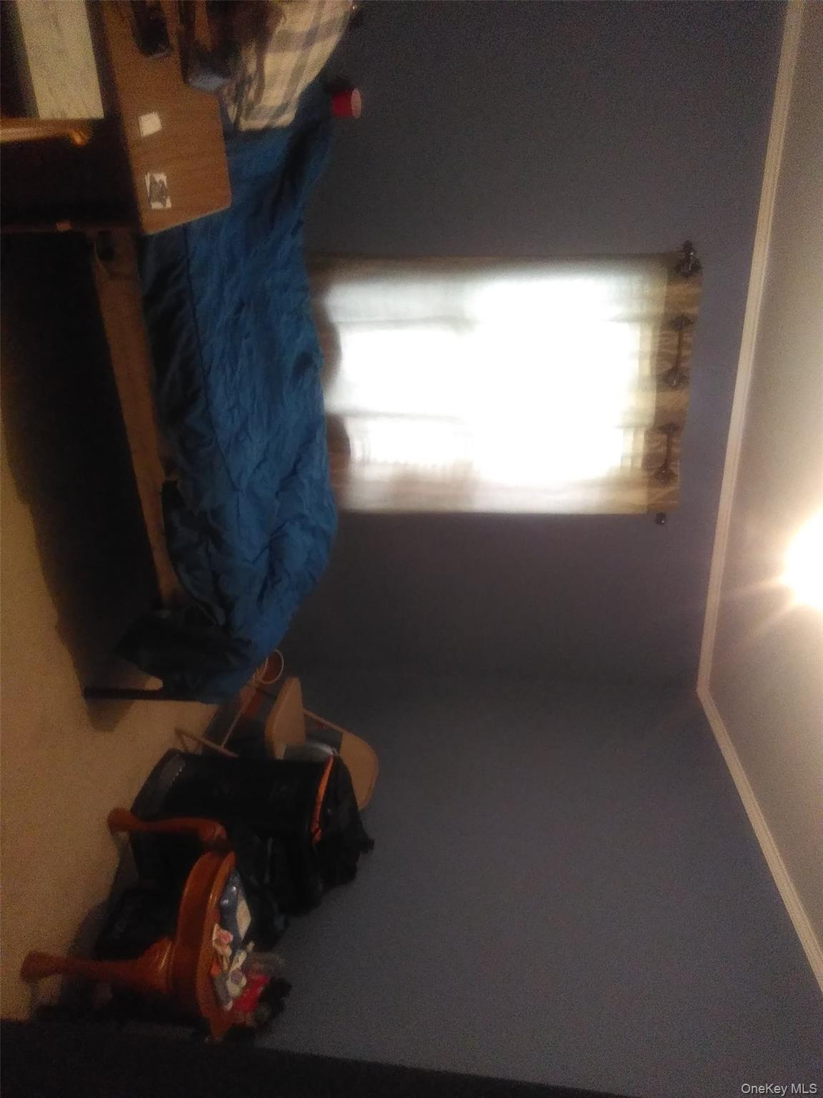 2032 Champlin Road Jefferson, NY 12093 - Photo 17 of 20 a bedroom with a bed and a window