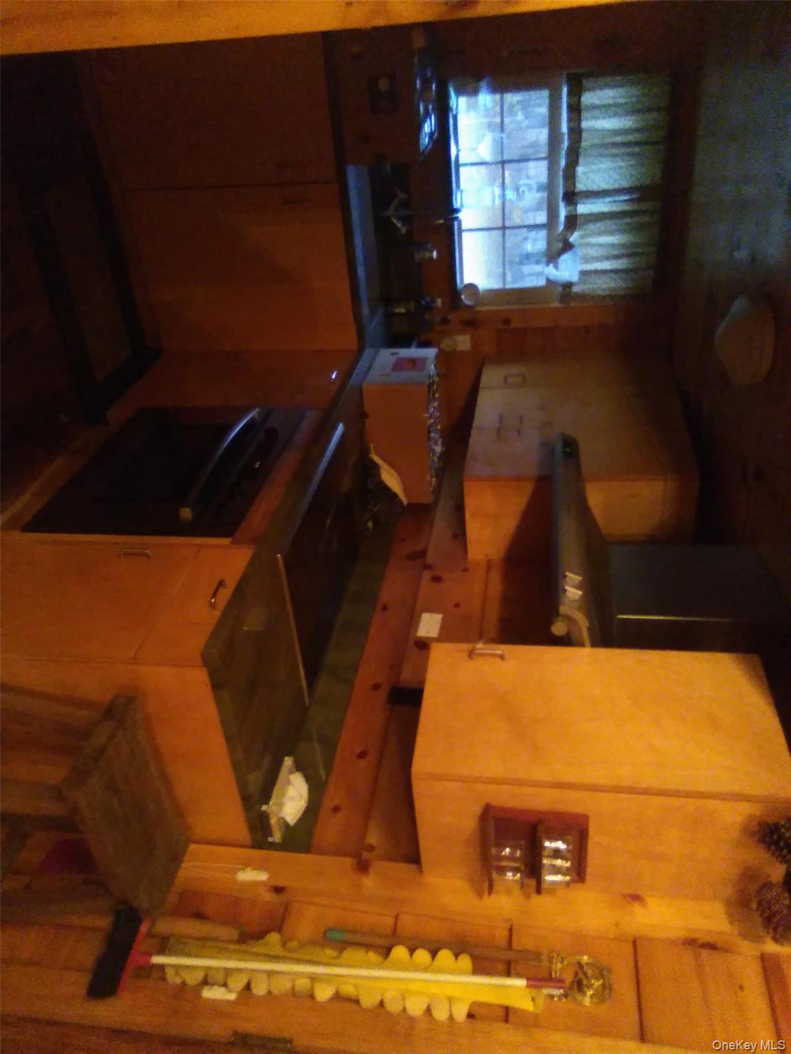2032 Champlin Road Jefferson, NY 12093 - Photo 8 of 20 a kitchen with a sink and a stove
