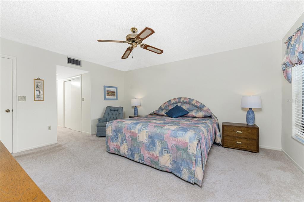 3245 Sugarloaf Key Road, Unit 24A Punta Gorda, FL 33955 - Photo 22 of 52 a bedroom with bed and window