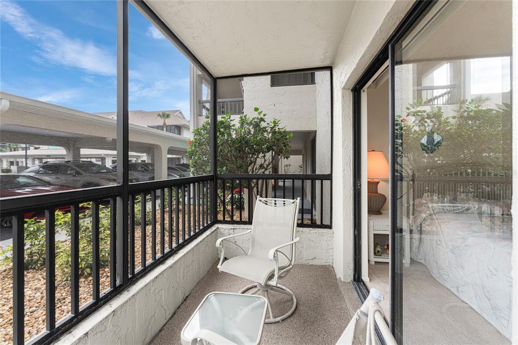 3245 Sugarloaf Key Road, Unit 24A Punta Gorda, FL 33955 - Photo 31 of 52 a room with balcony and wooden floor