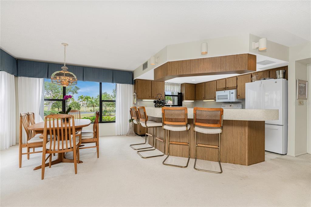 3245 Sugarloaf Key Road, Unit 24A Punta Gorda, FL 33955 - Photo 8 of 52 a living room with furniture and a large window