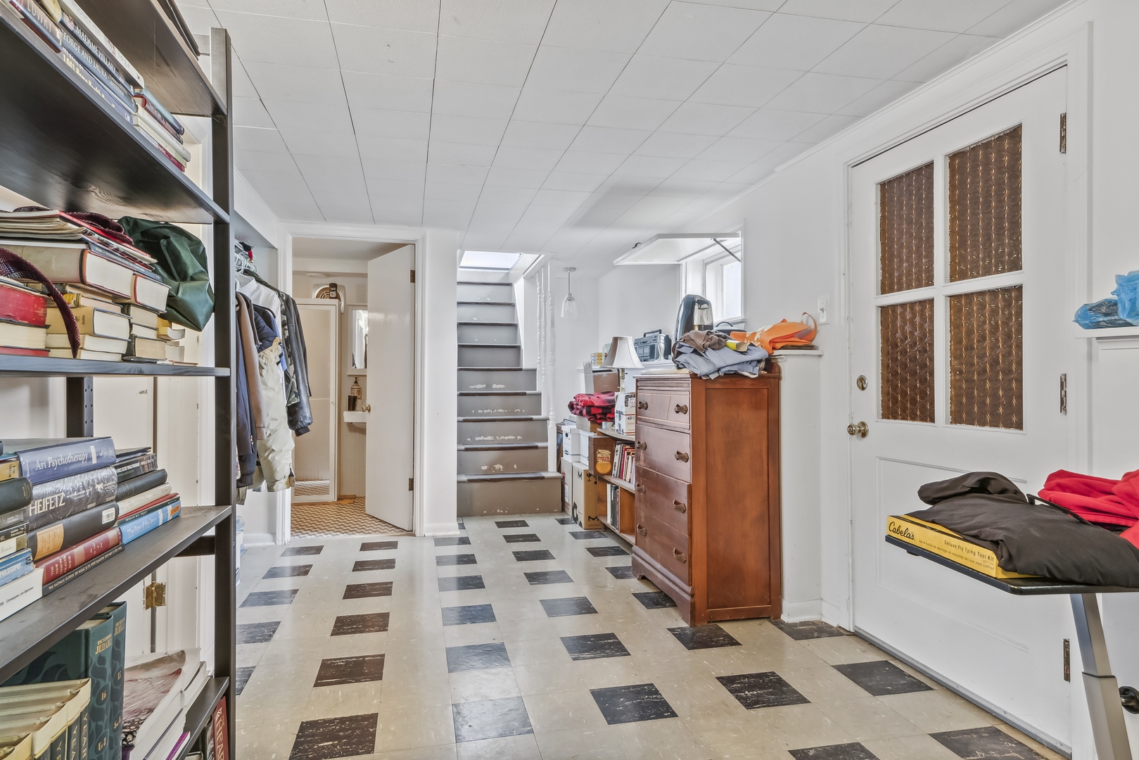 718 Sheridan Road Lake Bluff, IL 60044 - Photo 12 of 36 a view of walk in closet with clothes and shoes