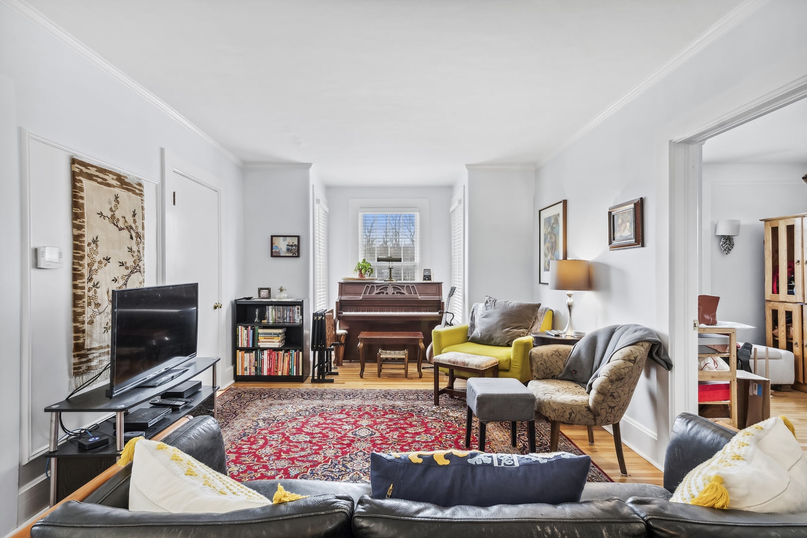 718 Sheridan Road Lake Bluff, IL 60044 - Photo 14 of 36 a living room with furniture a flat screen tv and a fireplace
