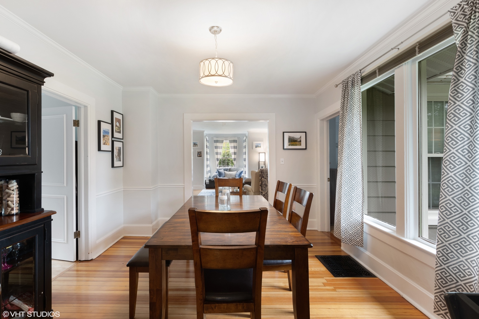 718 Sheridan Road Lake Bluff, IL 60044 - Photo 22 of 36 a view of a dining room with furniture window and wooden floor