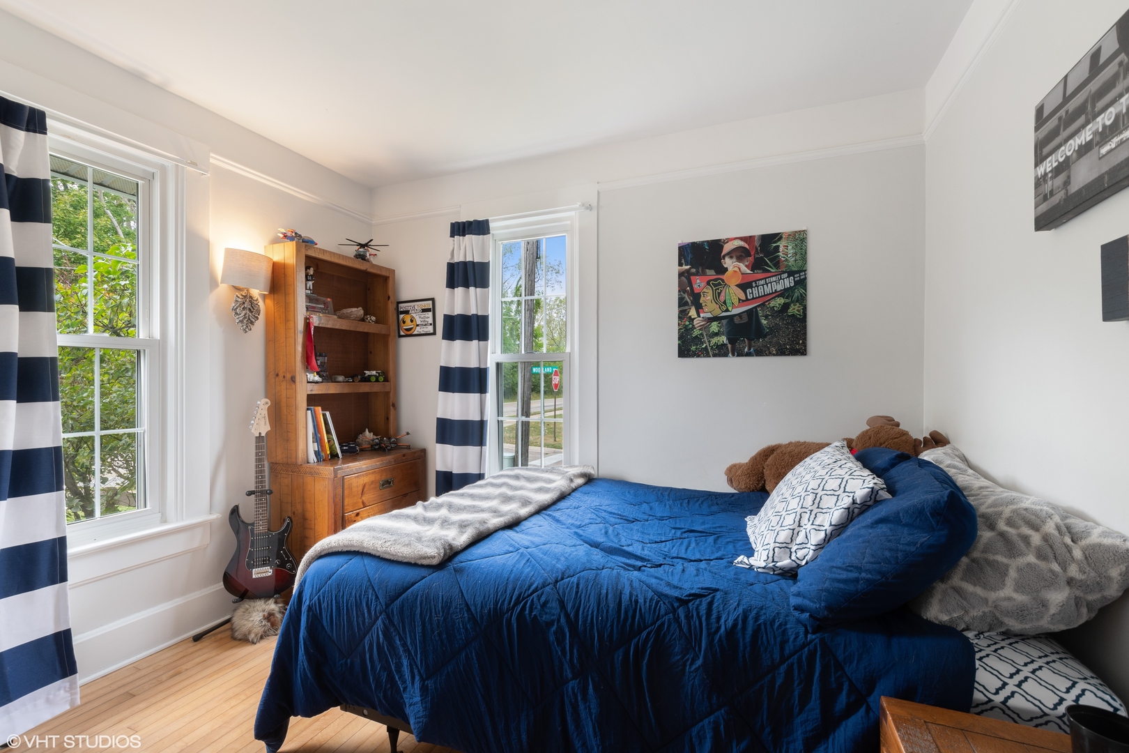 718 Sheridan Road Lake Bluff, IL 60044 - Photo 27 of 36 a bedroom with a large bed and a window