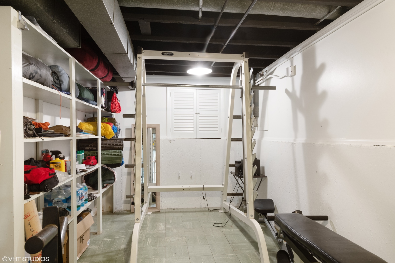 718 Sheridan Road Lake Bluff, IL 60044 - Photo 31 of 36 a view of walk in closet with clothes and shoes