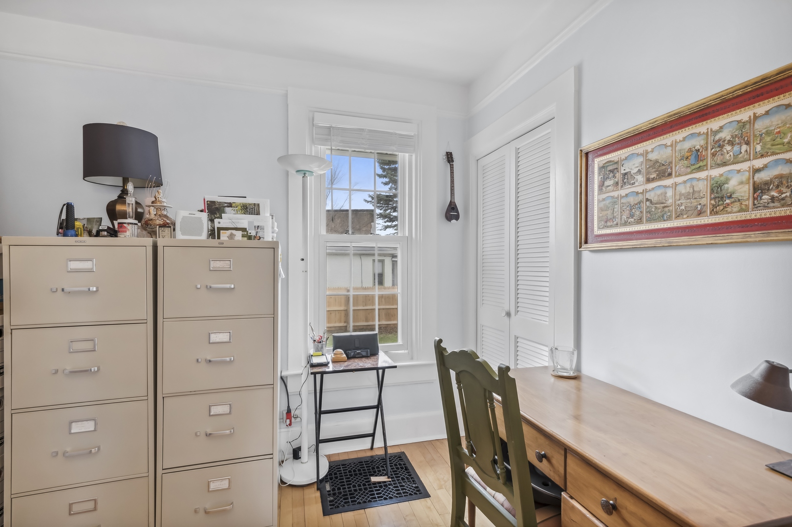 718 Sheridan Road Lake Bluff, IL 60044 - Photo 8 of 36 a view of a workspace with furniture and a window