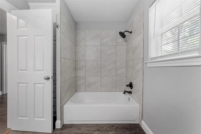 a bathroom with a bathtub