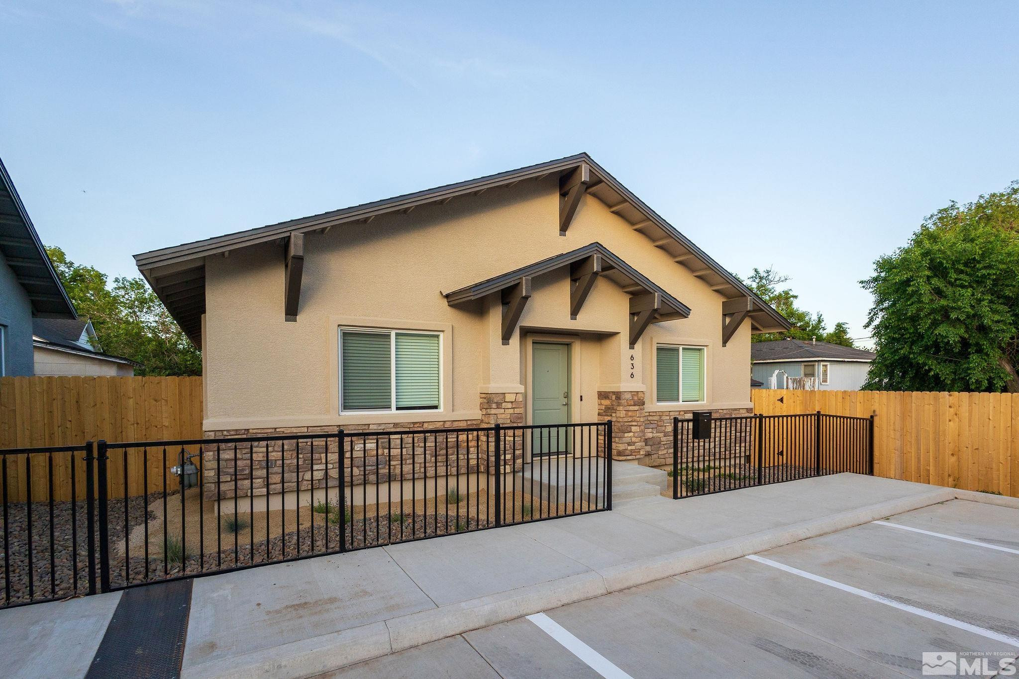 630 West 9th Street Reno, NV 89503 - Photo 8 of 20 a view of a house with wooden fence