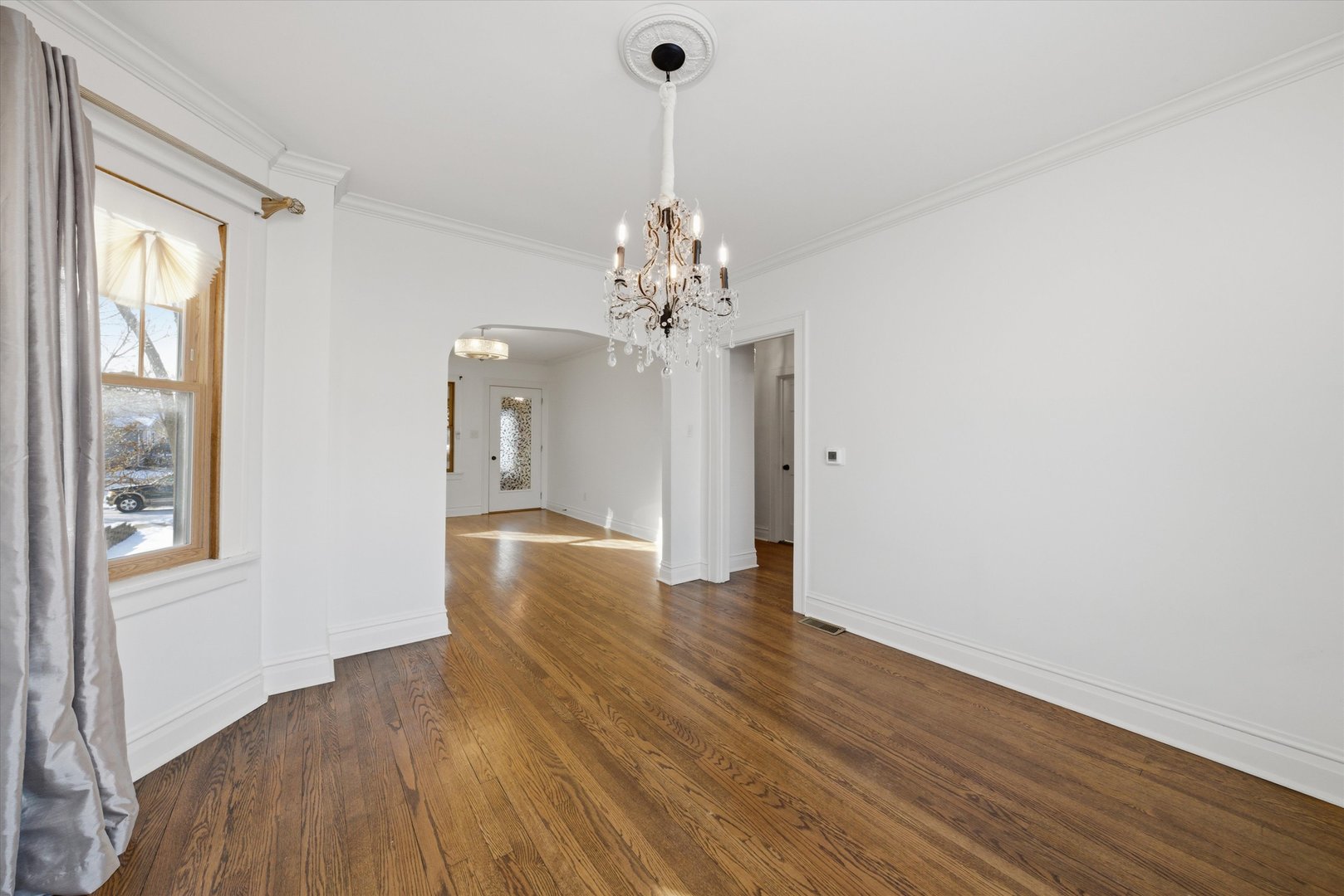314 Elm Street Lombard, IL 60148 - Photo 11 of 43 a view of a livingroom with an empty space and a window