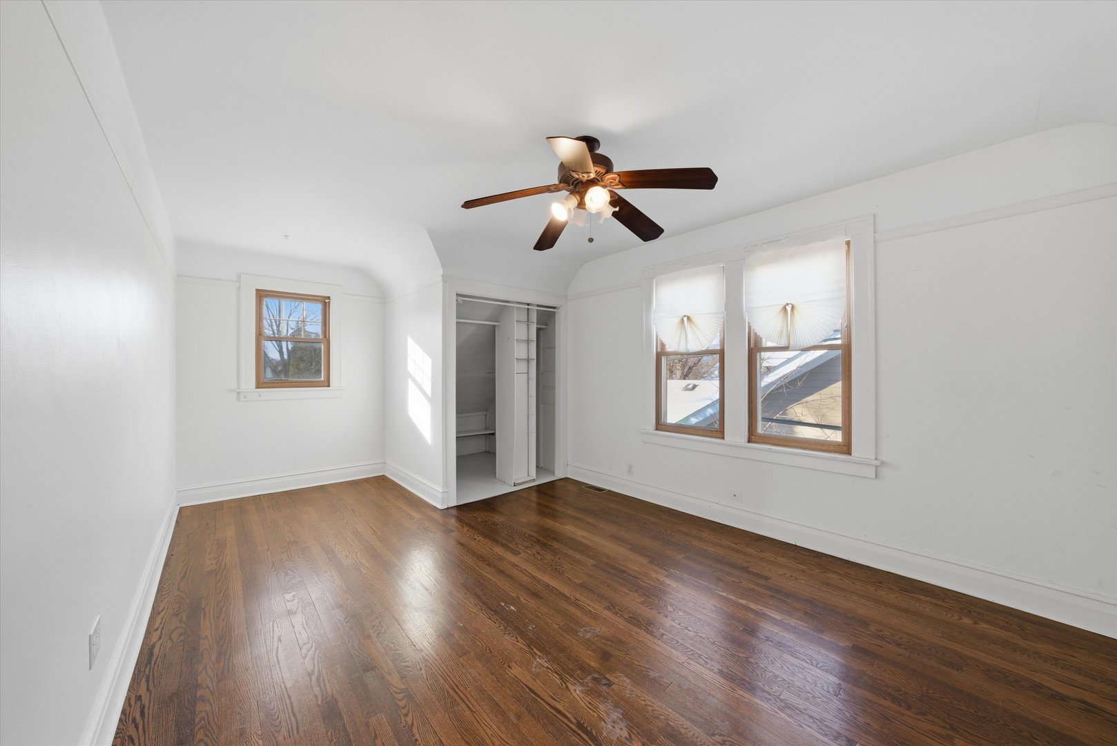 314 Elm Street Lombard, IL 60148 - Photo 15 of 43 a view of empty room with wooden floor and fan