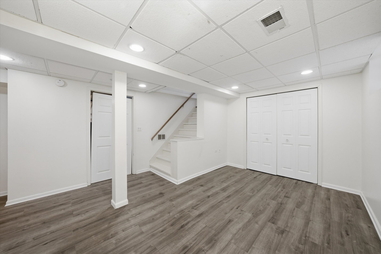 314 Elm Street Lombard, IL 60148 - Photo 27 of 43 a view of an empty room with wooden floor