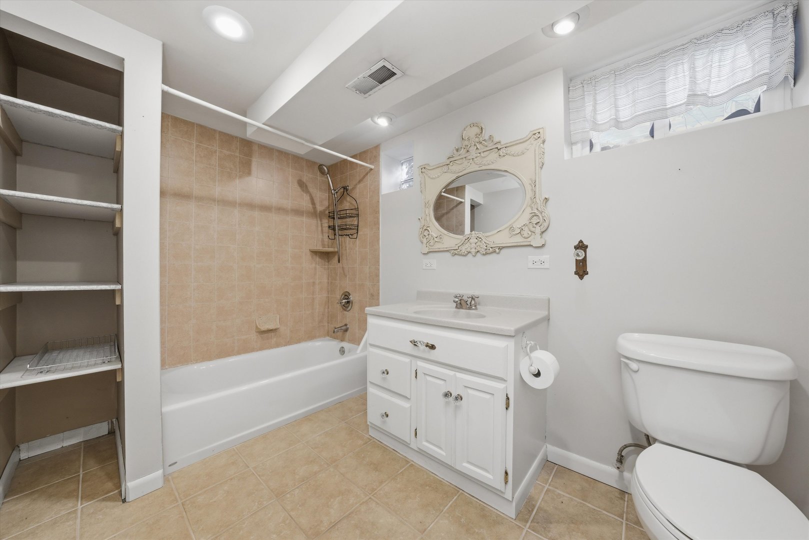 314 Elm Street Lombard, IL 60148 - Photo 30 of 43 a bathroom with a sink a toilet and shower