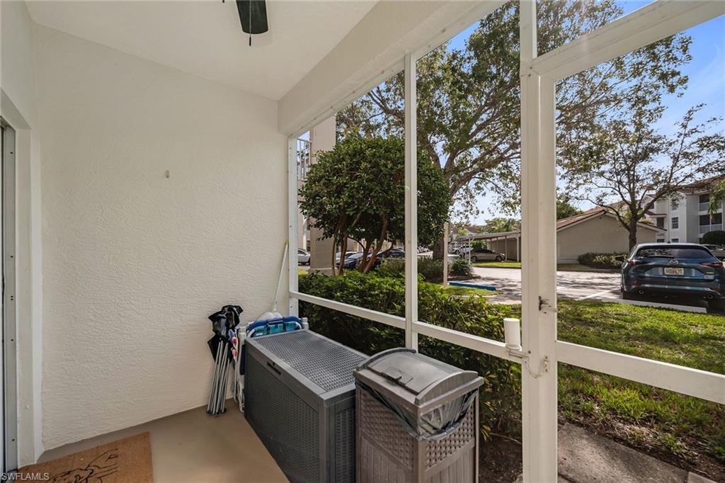 4620 St Croix Lane, Unit 918 Naples, FL 34109 - Photo 18 of 43 a view of a balcony with chairs
