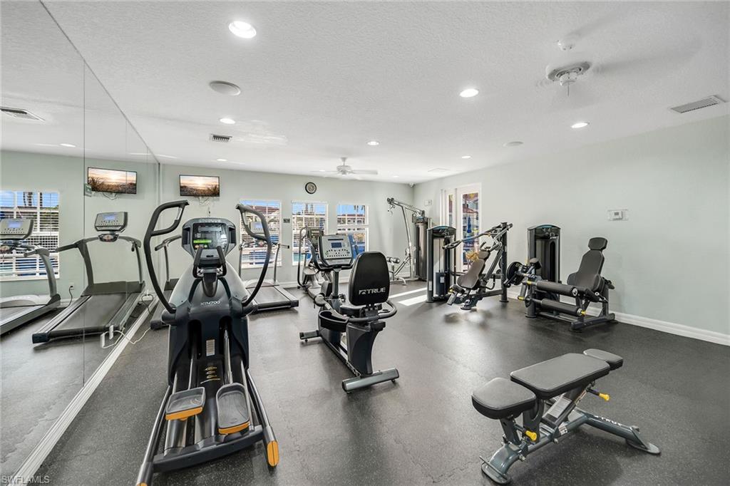 4620 St Croix Lane, Unit 918 Naples, FL 34109 - Photo 35 of 43 a view of a room with gym equipment