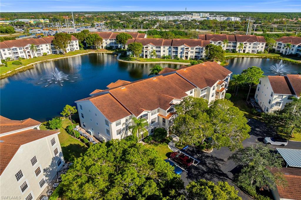 4620 St Croix Lane, Unit 918 Naples, FL 34109 - Photo 42 of 43 a view of a city with lake