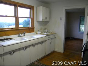 249 Howardsville Road Staunton, VA 24401 - Photo 6 of 10 a bathroom with a sink a mirror and a window