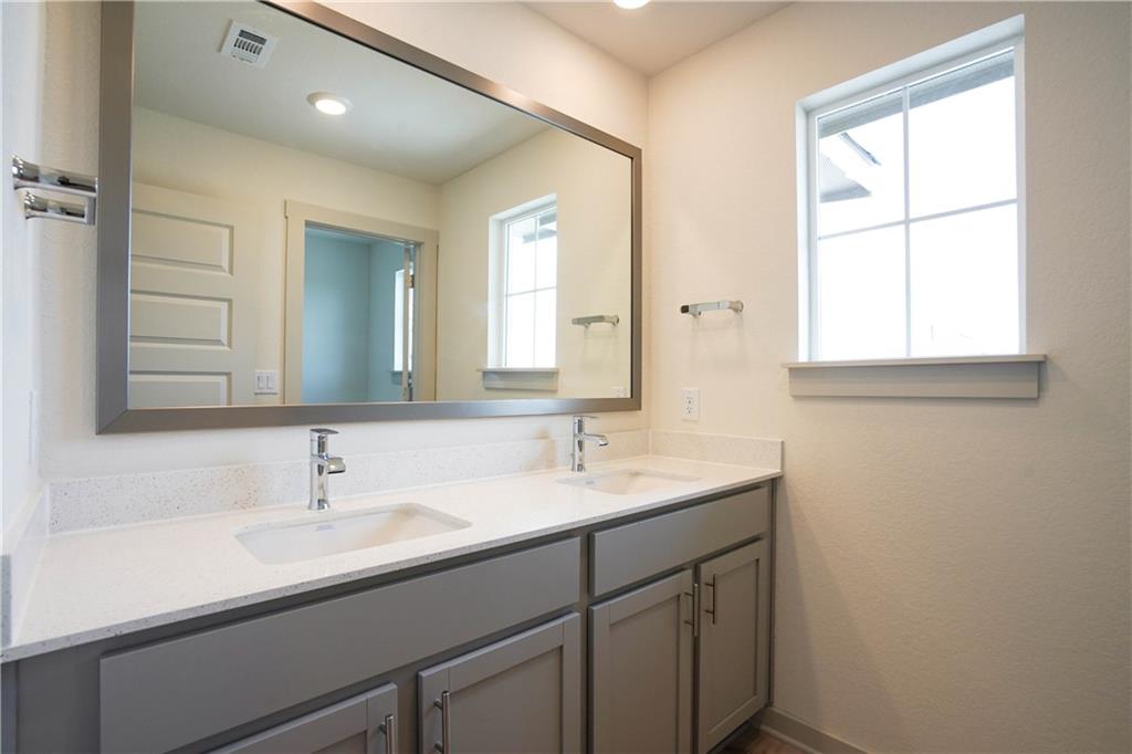 2341 Gabriels Horn Road Leander, TX 78641 - Photo 9 of 20 Full bathroom with double vanity