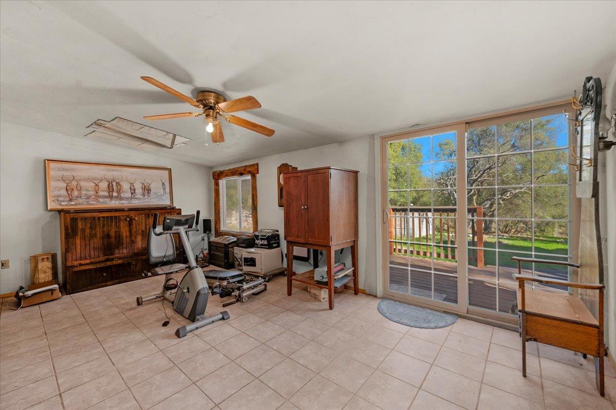 45522 Windmill Road Coarsegold, CA 93614 - Photo 35 of 74 a view of a livingroom with workspace and a window