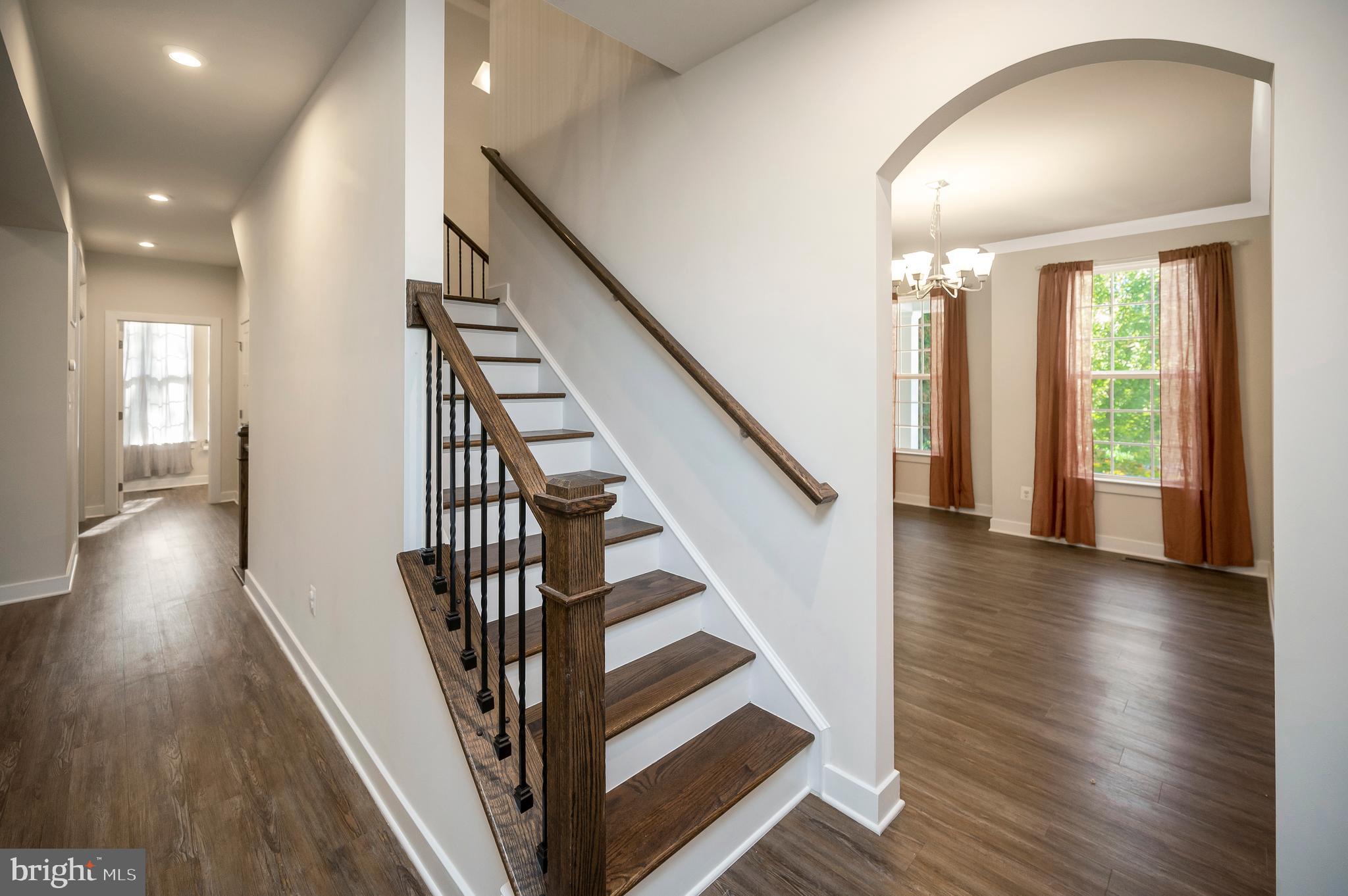 34 Oak Road Stafford, VA 22556 - Photo 18 of 39 a view of a hallway with wooden floor and staircase
