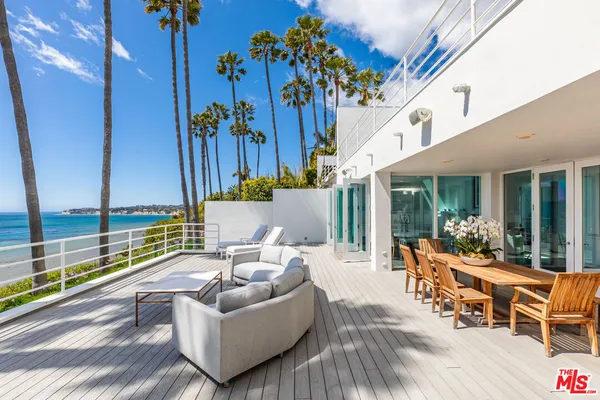 a building outdoor space with patio furniture