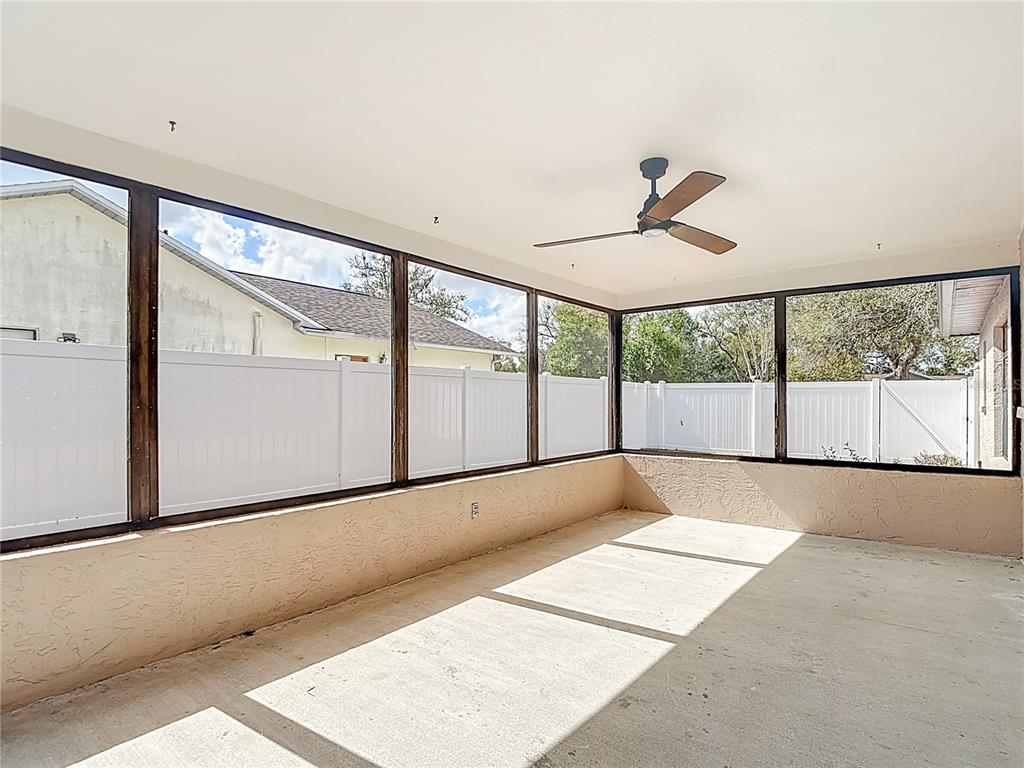 7478 Dundee Way Weeki Wachee, FL 34613 - Photo 47 of 52 a view of an empty room with a window