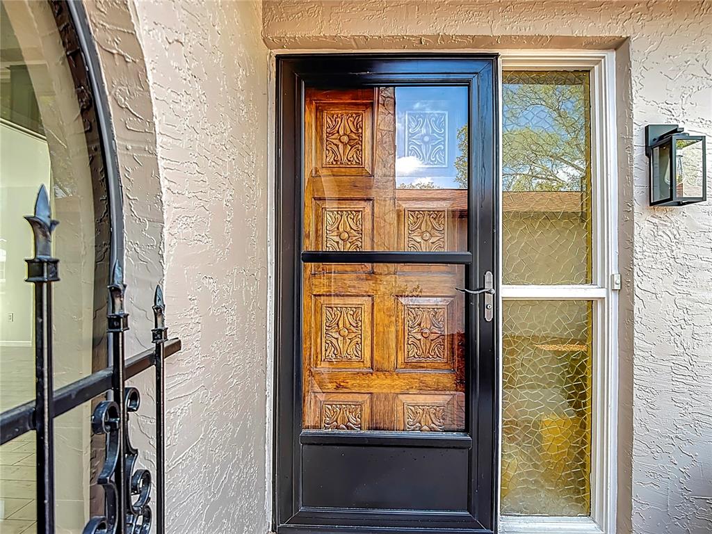 7478 Dundee Way Weeki Wachee, FL 34613 - Photo 6 of 52 a view of front door