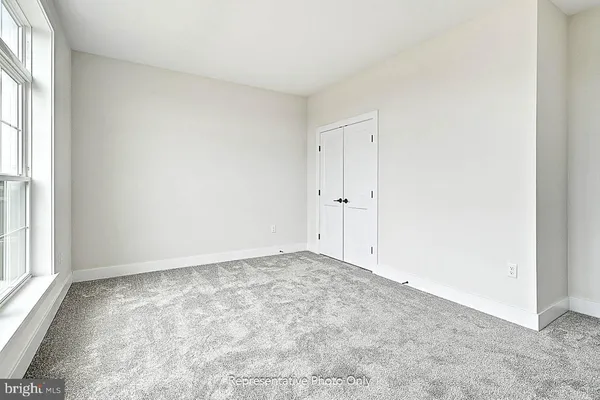 an empty room with a natural light