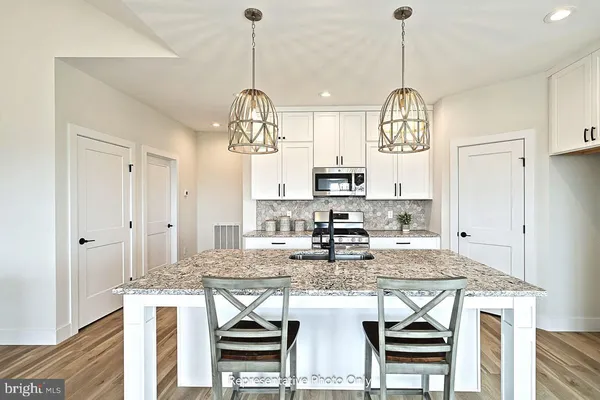 a view of kitchen and sink