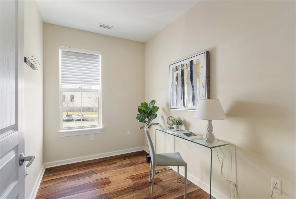 4 Repton Place, Unit 4213 Watertown, MA 02472 - Photo 17 of 19 a workspace room with furniture and windows
