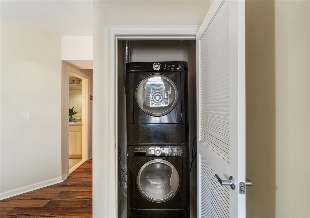 4 Repton Place, Unit 4213 Watertown, MA 02472 - Photo 19 of 19 a view of washer and dryer in a utility room