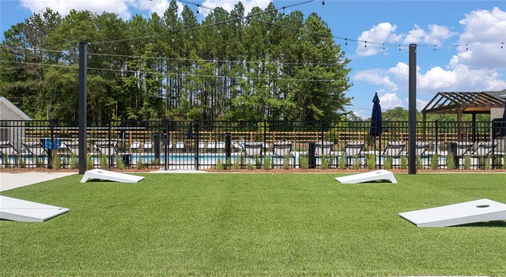 100 Rosemoore Drive Covington, GA 30014 - Photo 40 of 41 a view of a lake with a big yard