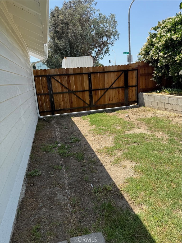 297 Garfield Avenue Pasadena, CA 91101 - Photo 25 of 28 a view of backyard with wooden fence