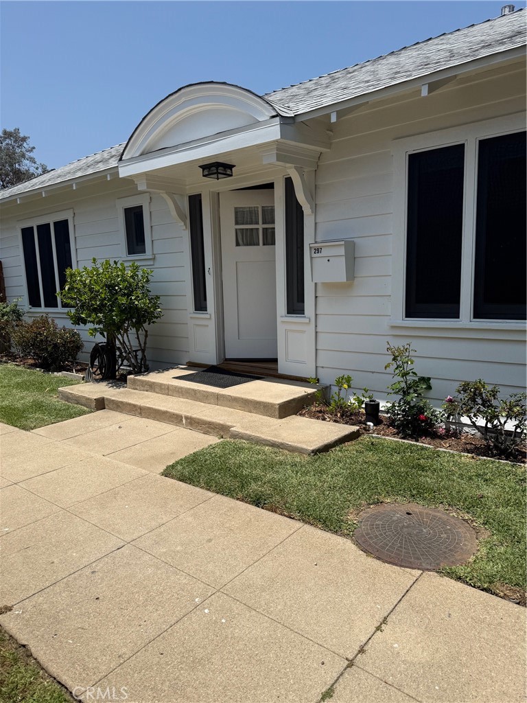 297 Garfield Avenue Pasadena, CA 91101 - Photo 3 of 28 a front view of a house with garden