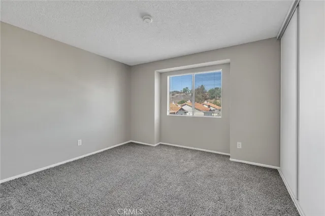 an empty room with window