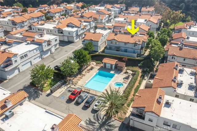 an aerial view of a houses with outdoor space