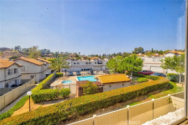 a view of a swimming pool with an ocean view