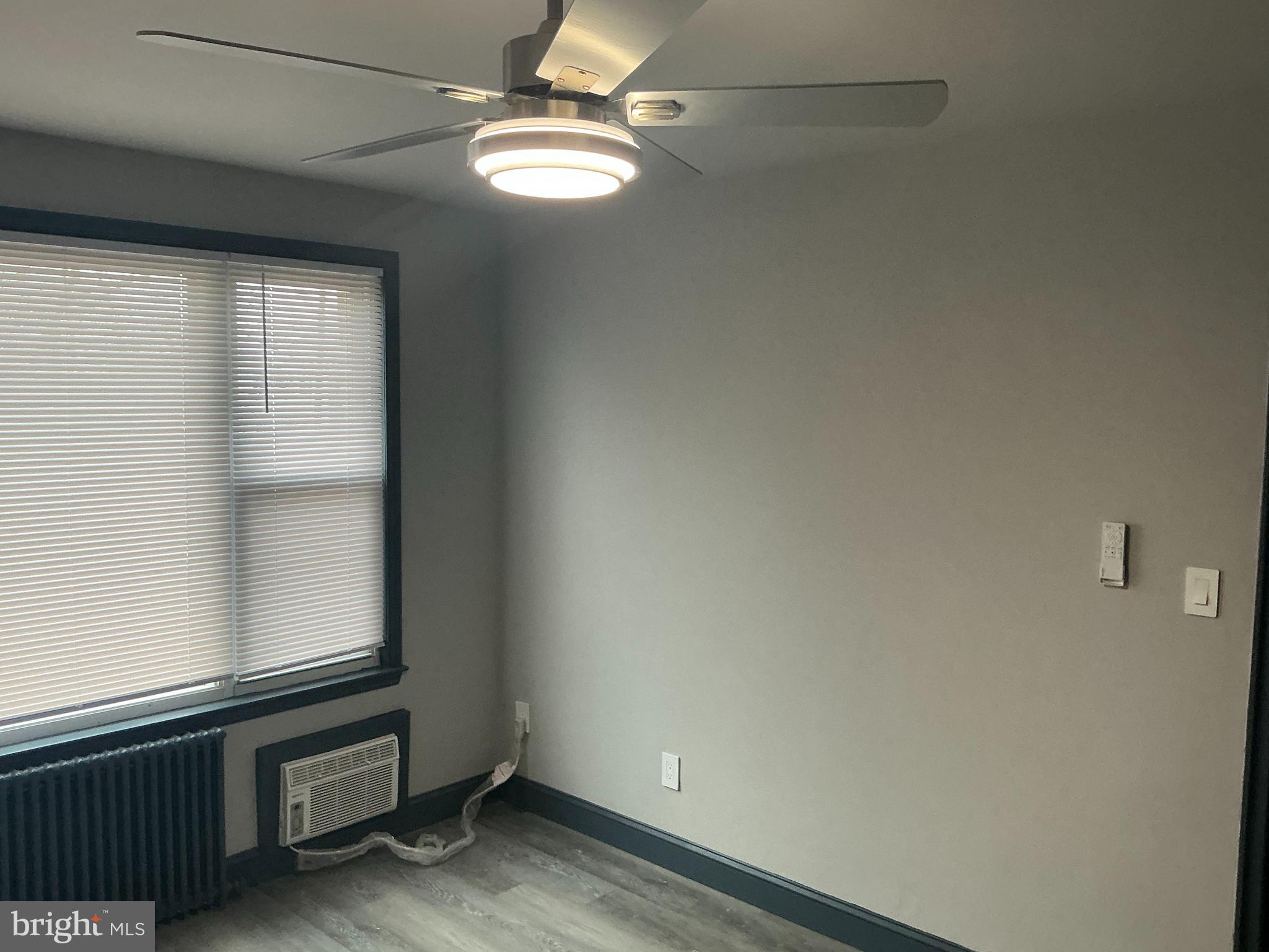 4004 E Street Southeast, Unit 106 Washington, DC 20019 - Photo 15 of 17 an empty room with windows