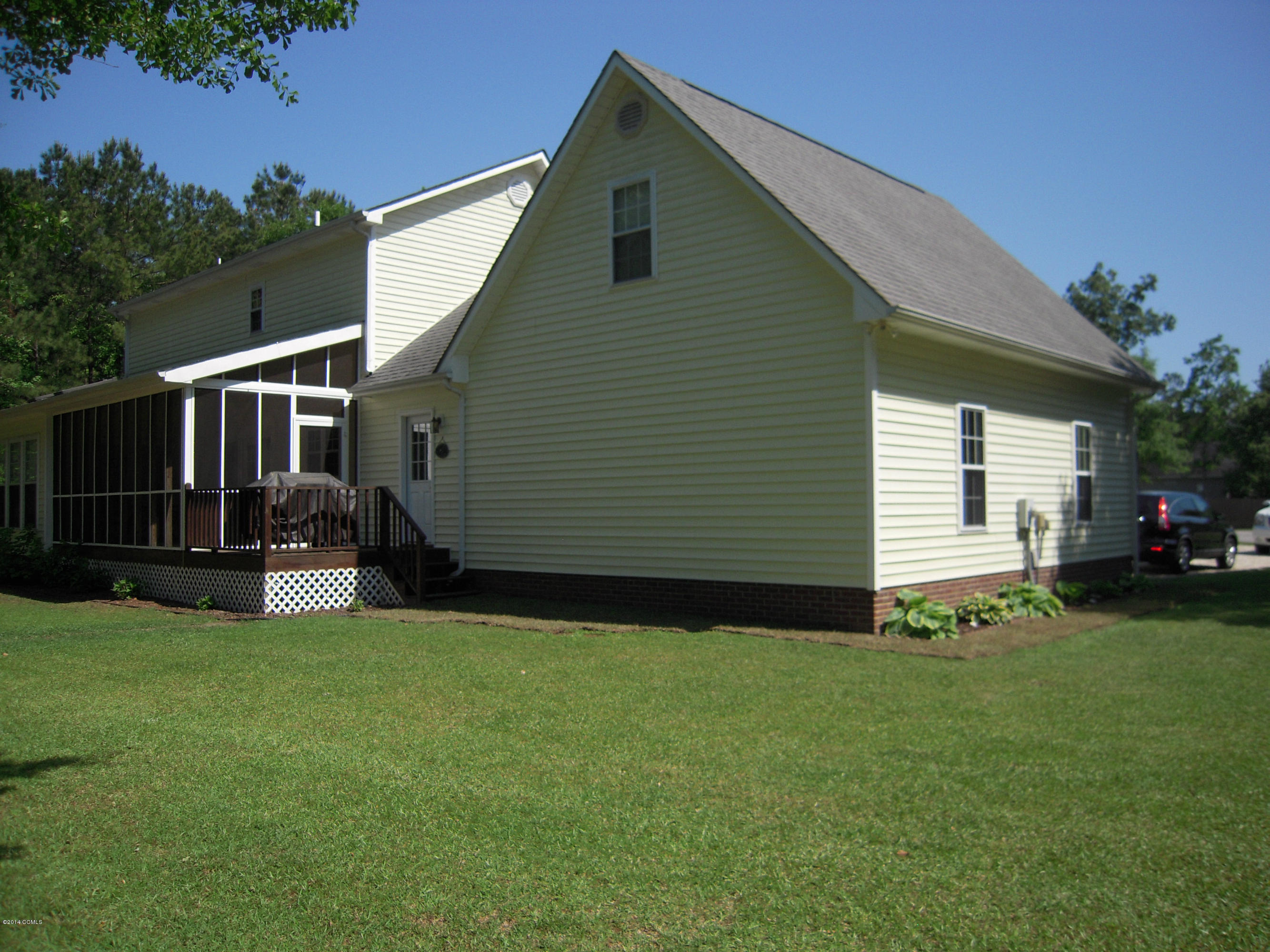 420 Riverside Lane Stella, NC 28582 - Photo 3 of 31 Side of home