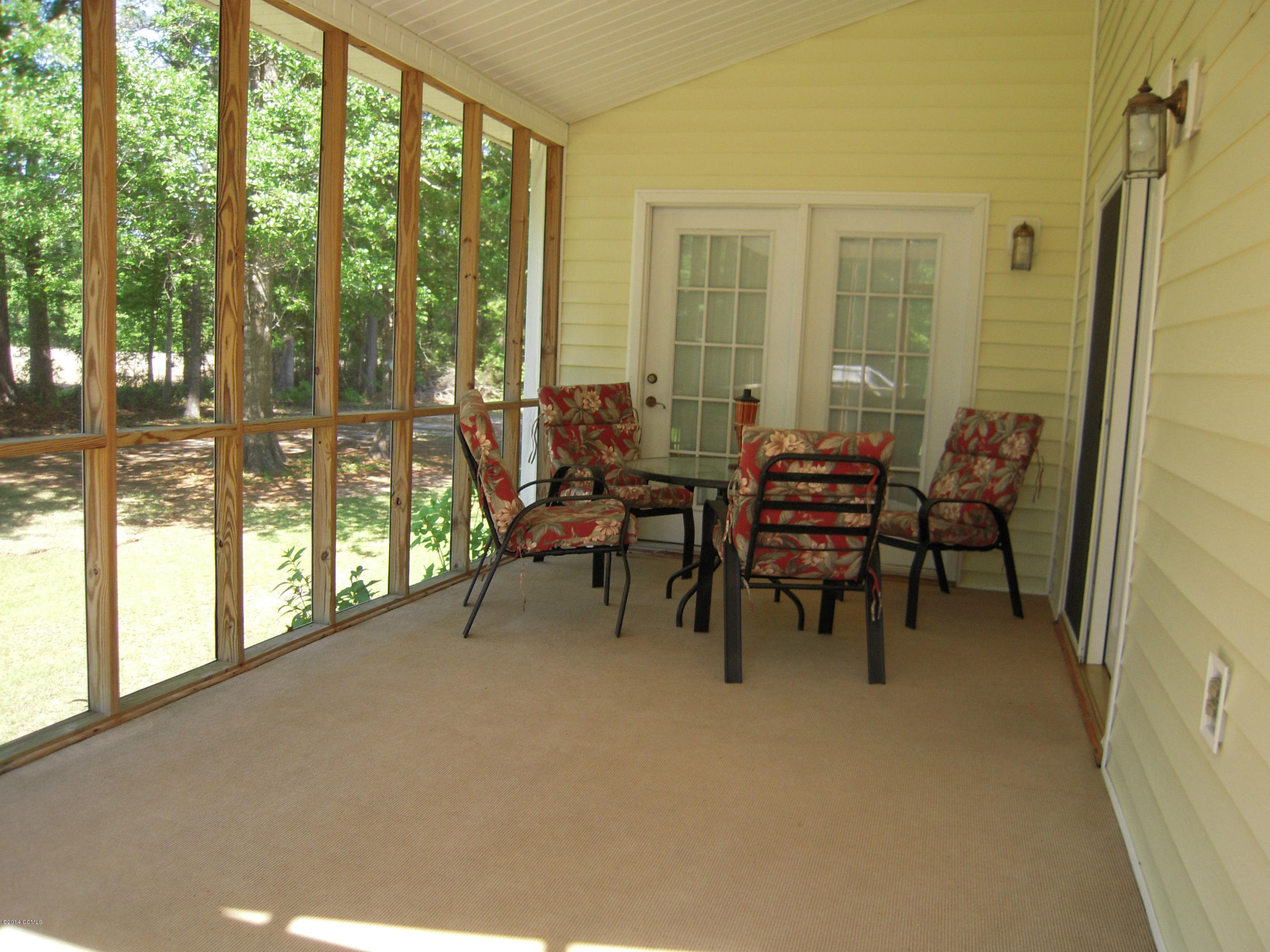 420 Riverside Lane Stella, NC 28582 - Photo 6 of 31 Screened porch