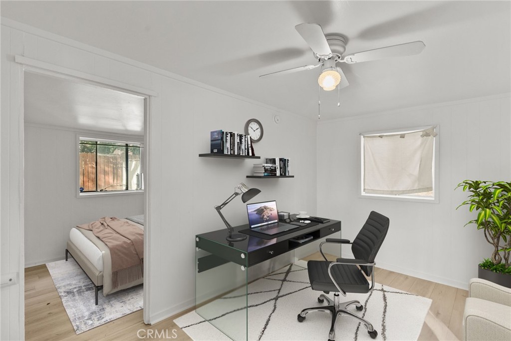 7053 Sunnycrest Trail Tujunga, CA 91042 - Photo 11 of 19 a view of a workspace with furniture and a window