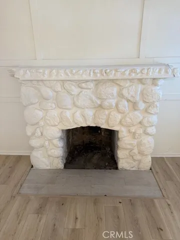 a living room with a fireplace